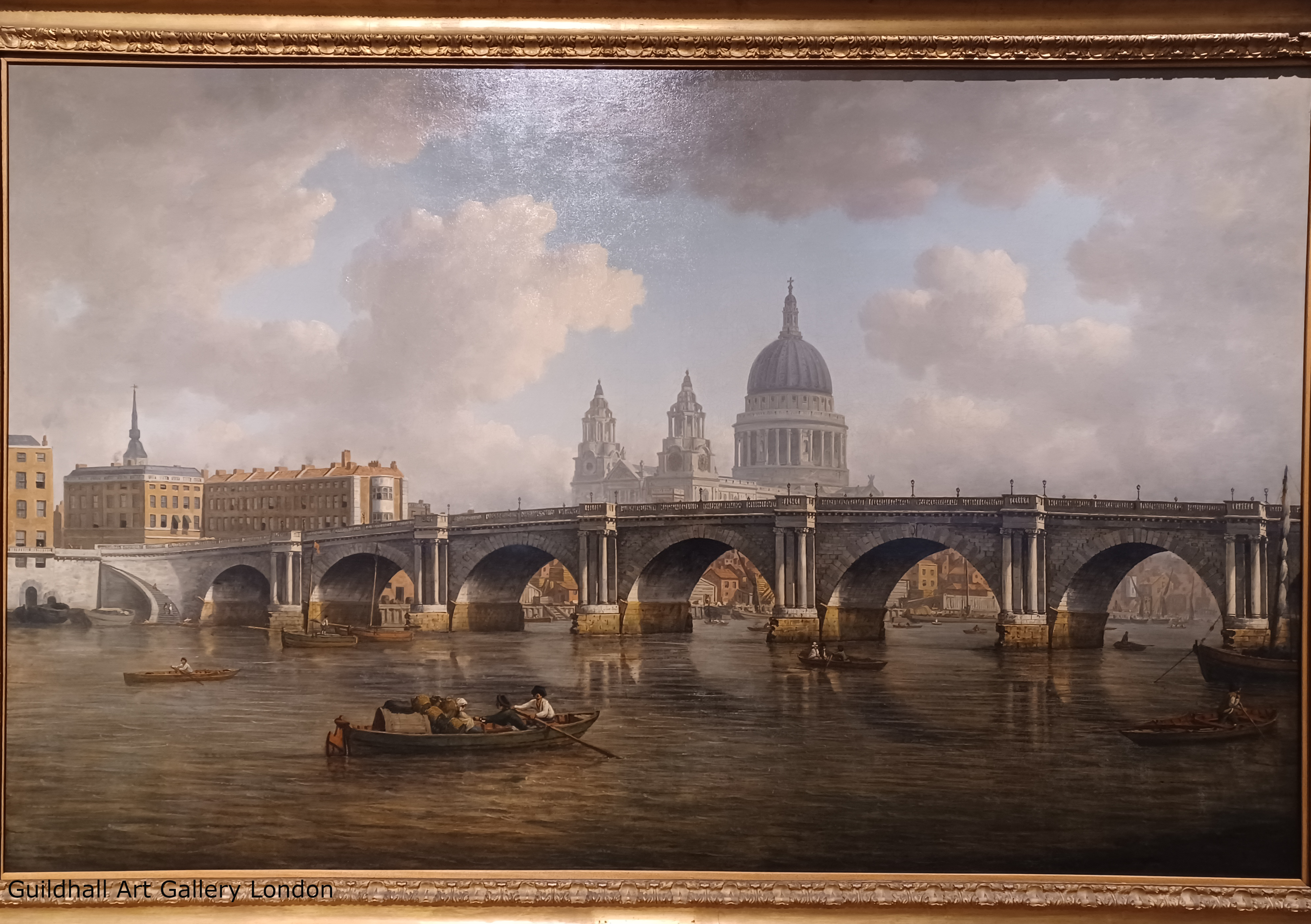 A beautiful fine art painting of the river Thames. You can see London Bridge in the background. Victorian days.