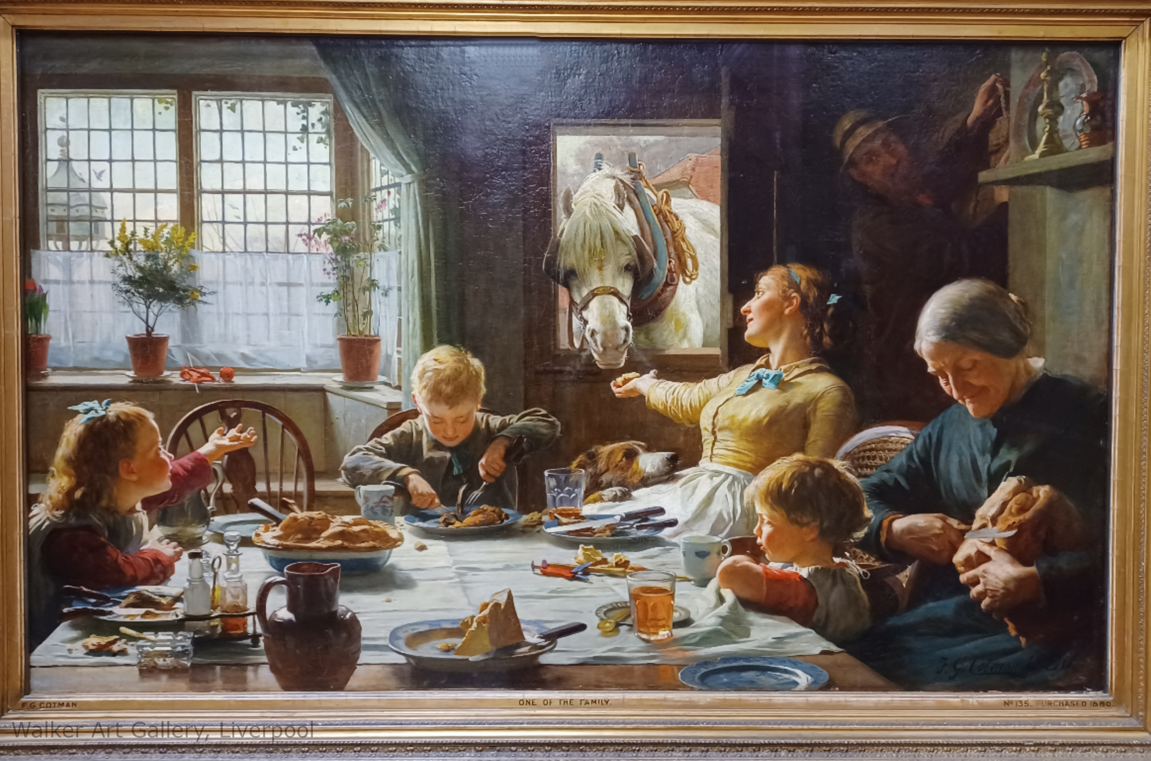 Magnificent fine art painting of a family dinner scene set in ancient olden days. Years appear to be 1700s or 1800s. There is a family eating dinner and feeding their horse who has its head through the door. Painting is named 'One of The Family'.