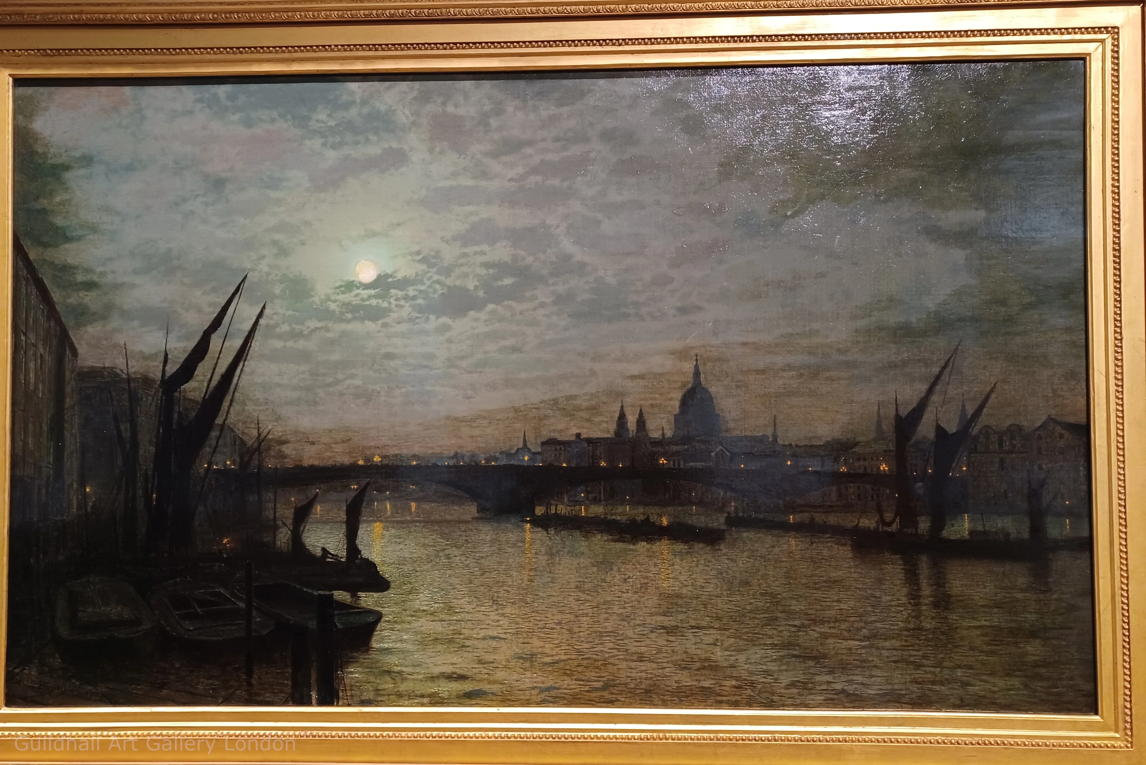 A beautiful fine art painting of the river Thames. This image shows a night scene. The lights flickering look beautiful.