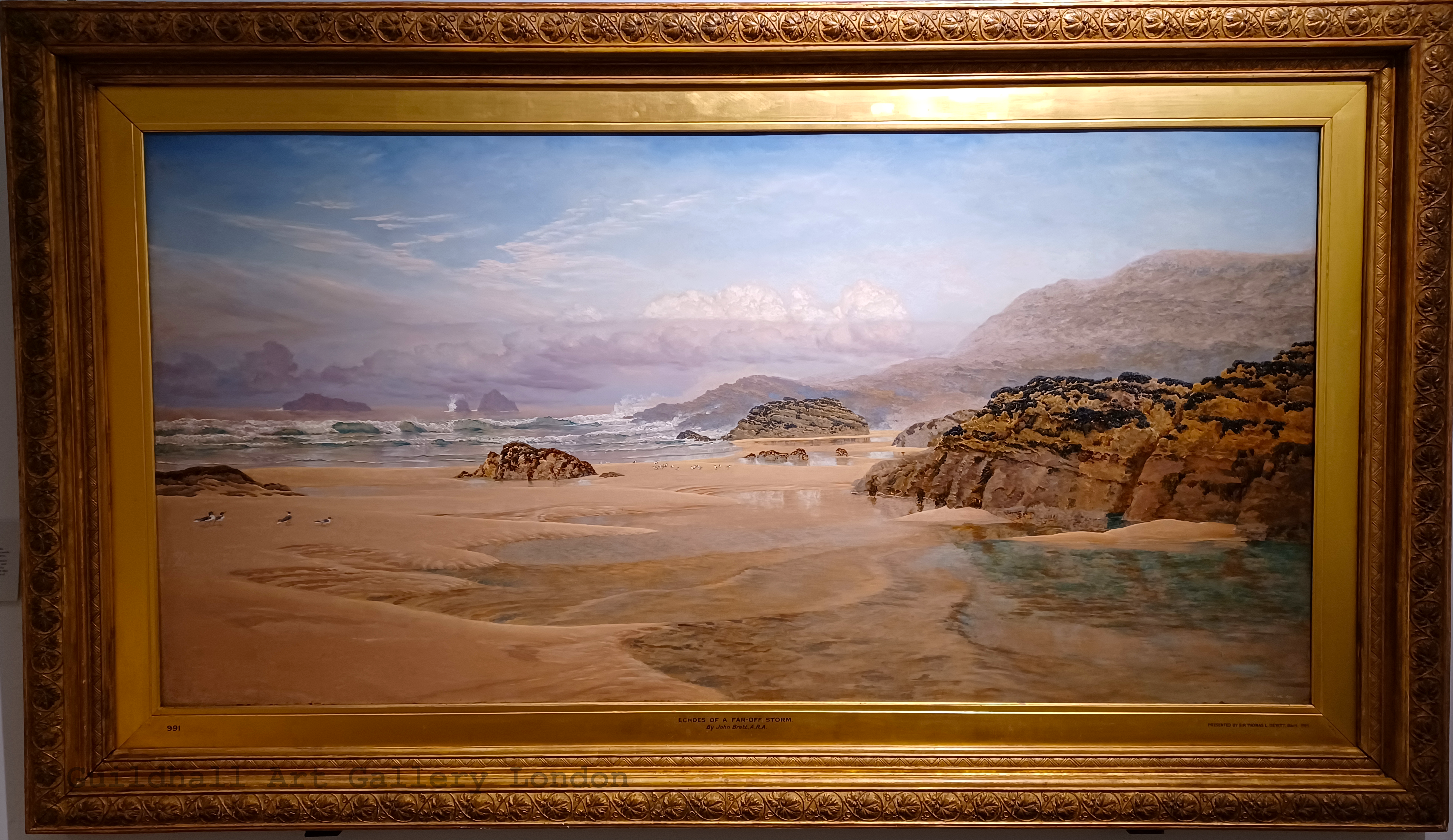 A beautiful fine art painting of a beach each. There are seagulls everywhere. The painting is very detailed.