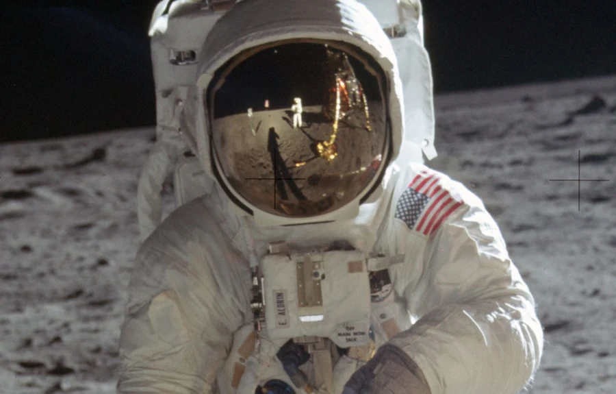 Photo of Buzz Aldrin on moon close up.