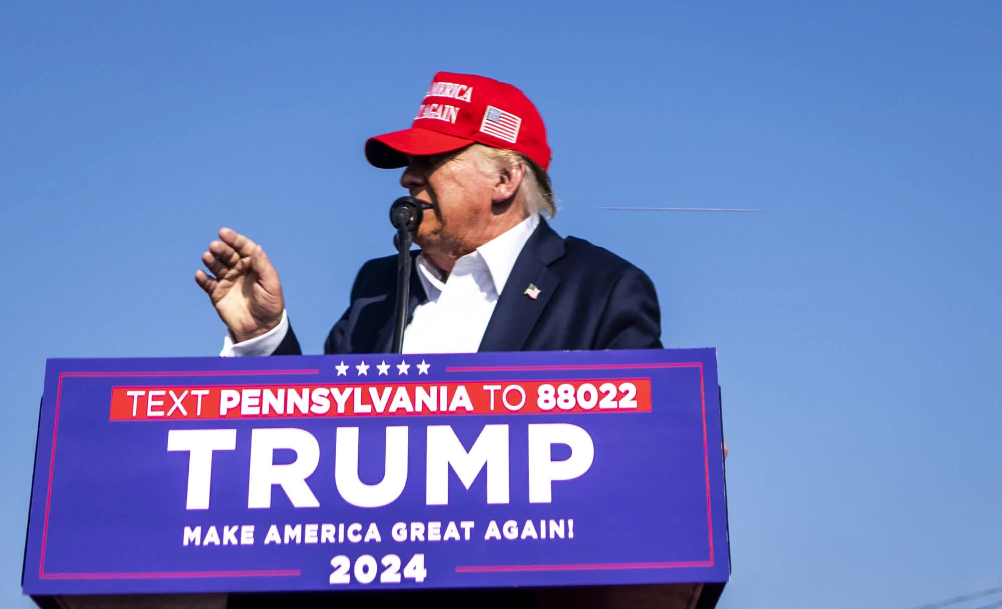 Photo shows a bullet whizzing past Trump's head.